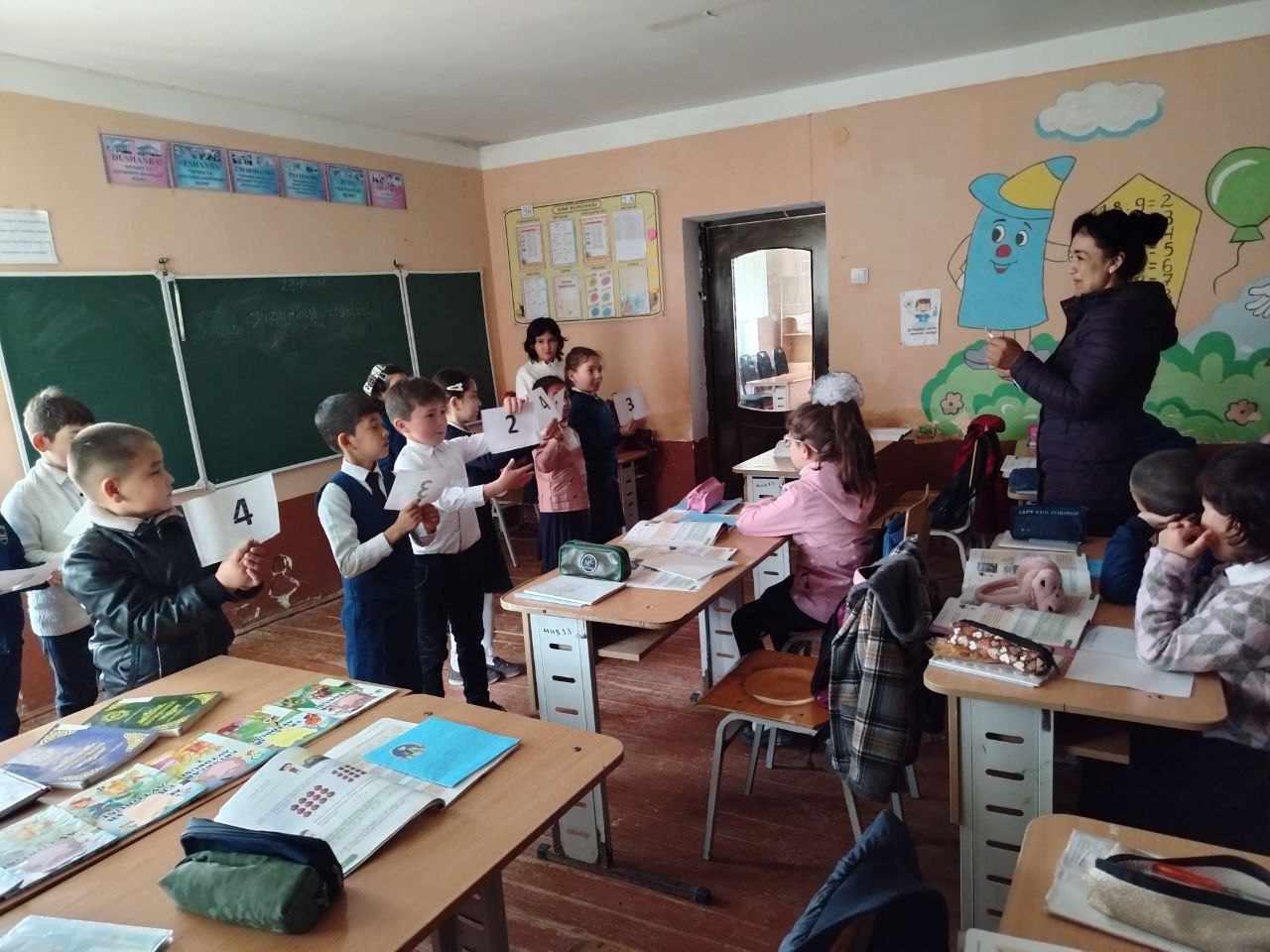 " Kitob bilan do'st bo'laman " nomli tadbir tashkil etildi.